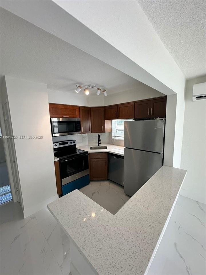 1520 Northeast 56th Street #8 - Photo 2 of 10