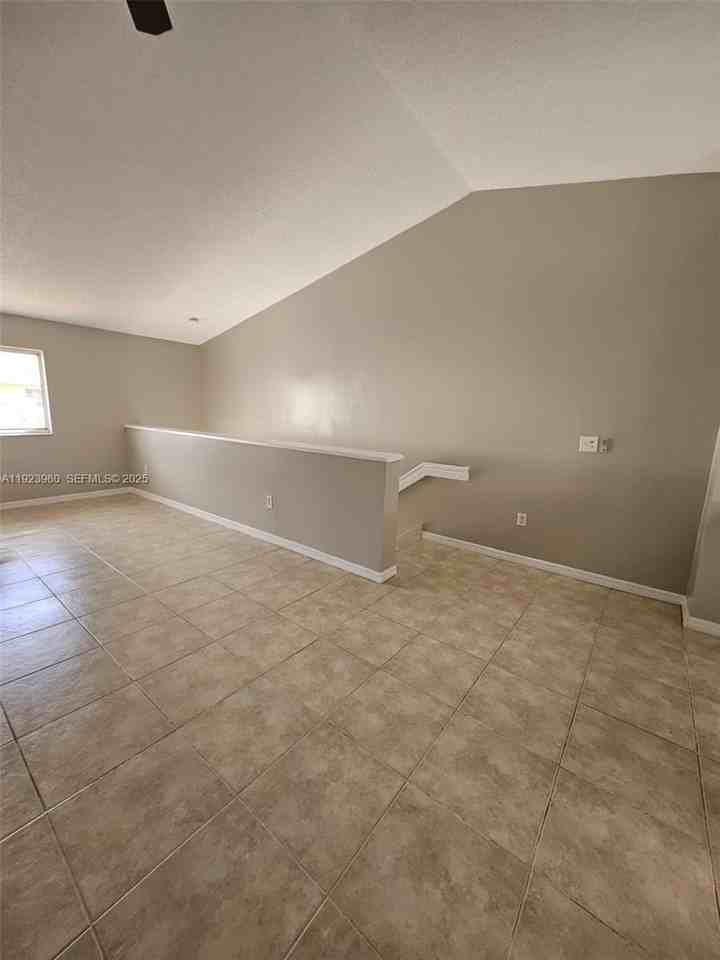 2527 W 76th St #208 - Photo 3 of 24