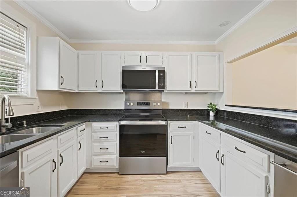 911 Hollyfax Cir Ne - Photo 3 of 32