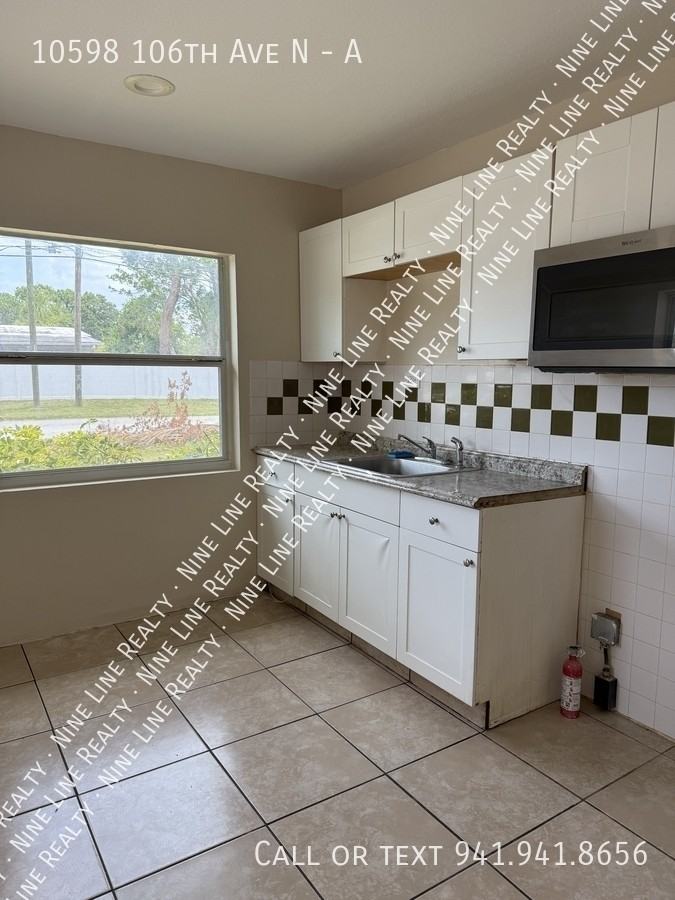 10598 106th Avenue North #A - Photo 2 of 10