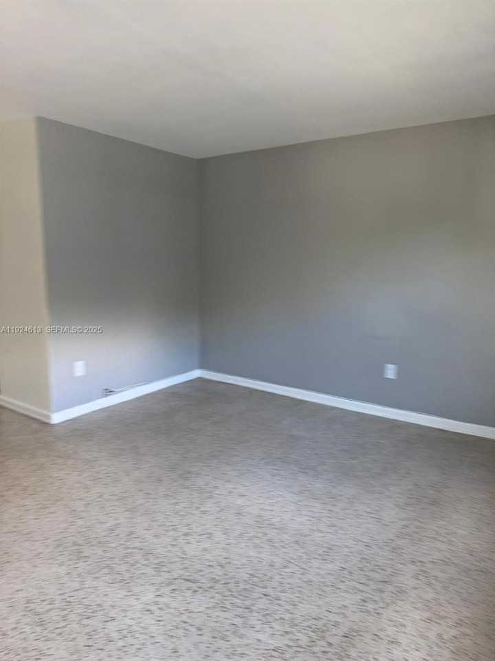 1940 Ne 167th St #3 - Photo 3 of 5