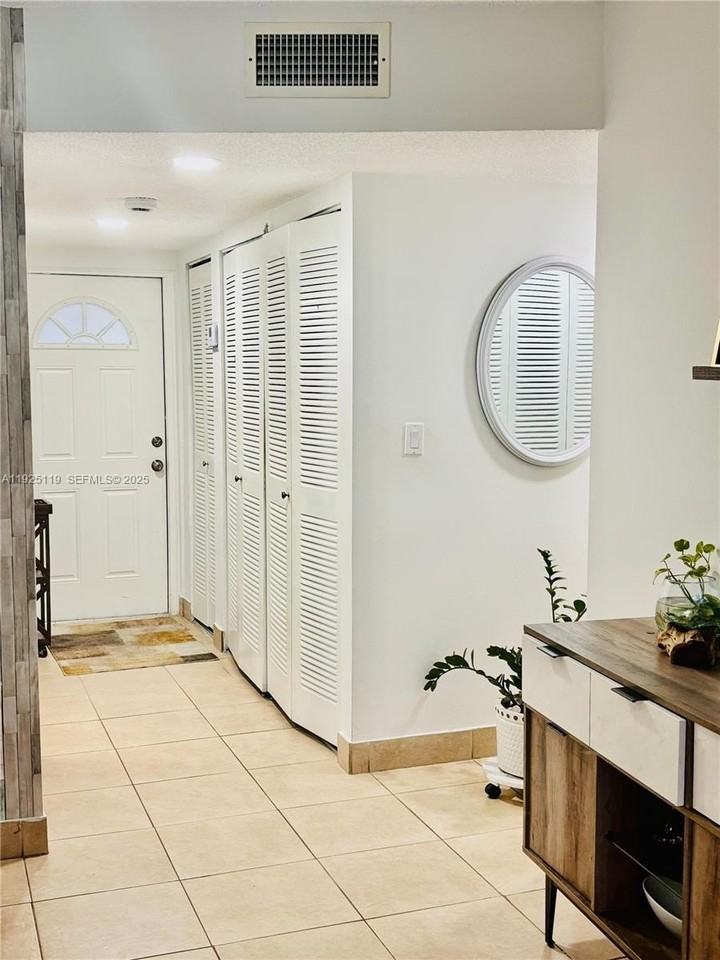 8350 Sands Point Blvd #E104 - Photo 4 of 13