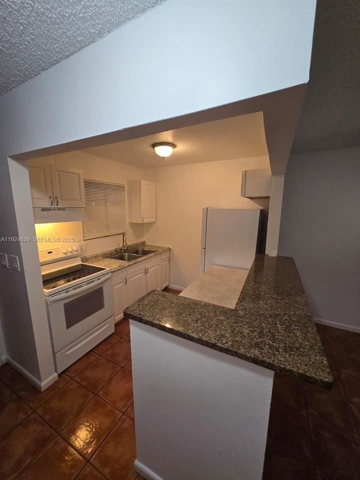 6094 Forest Hill Blvd #201 - Photo 2 of 12