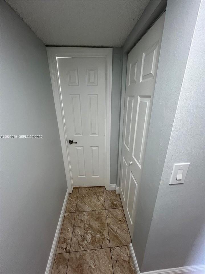 1075 W 68th St #218 - Photo 5 of 24