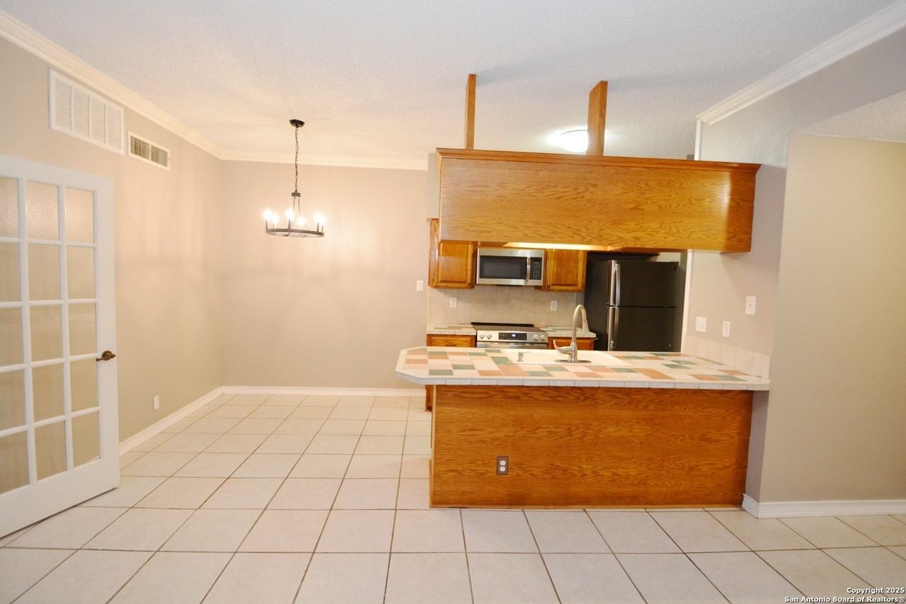 12446 Starcrest Dr Apt 403 #403 - Photo 5 of 15