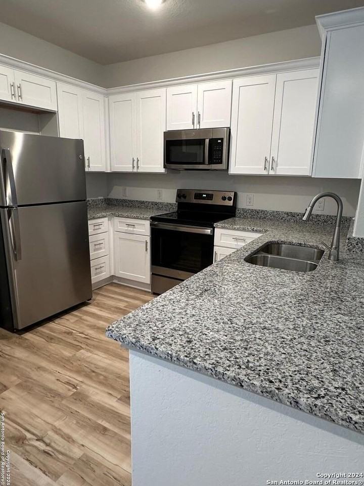 10220 Eaglewood Nook Unit 101 #101 - Photo 3 of 15