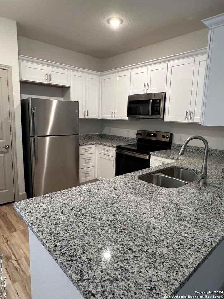 10220 Eaglewood Nook Unit 101 #101 - Photo 4 of 15