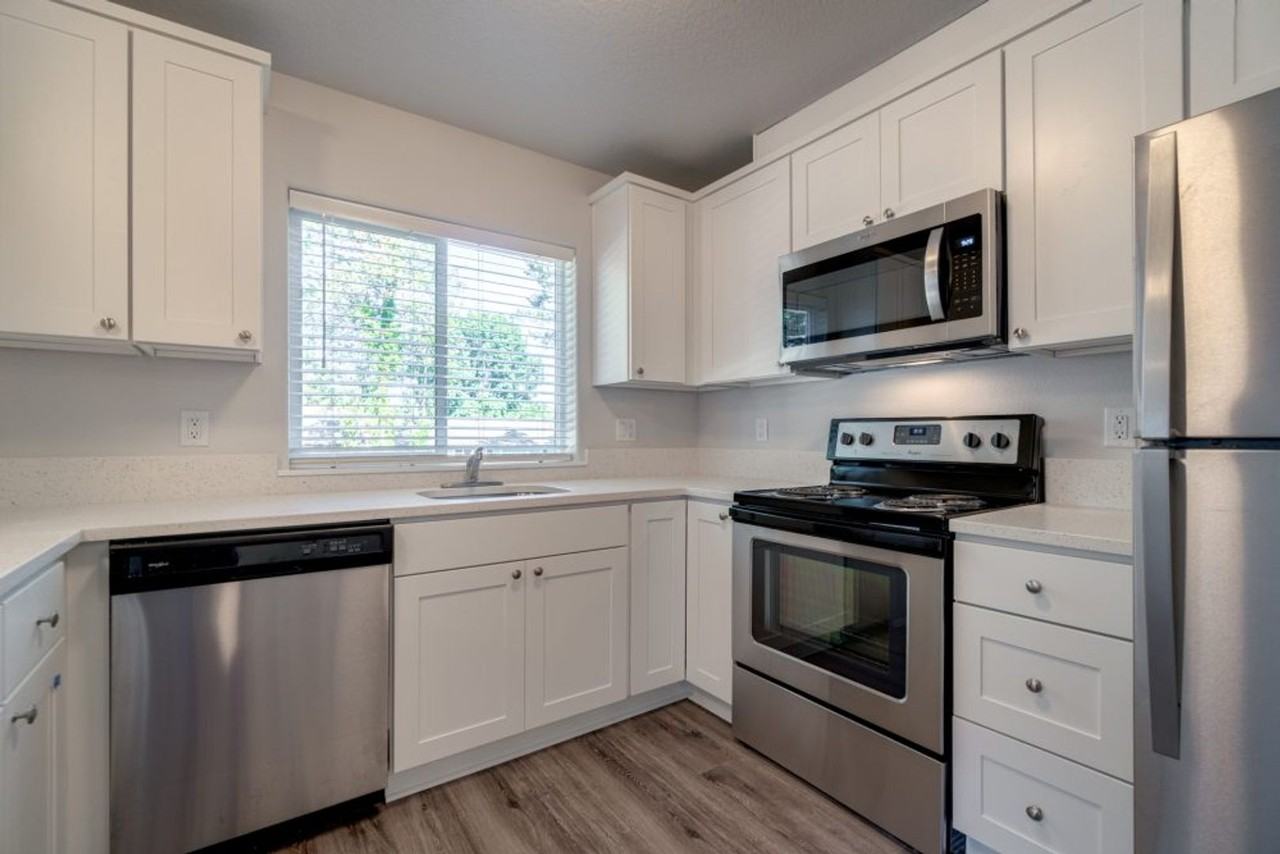 RIVERBEND APARTMENTS - Photo 2 of 18