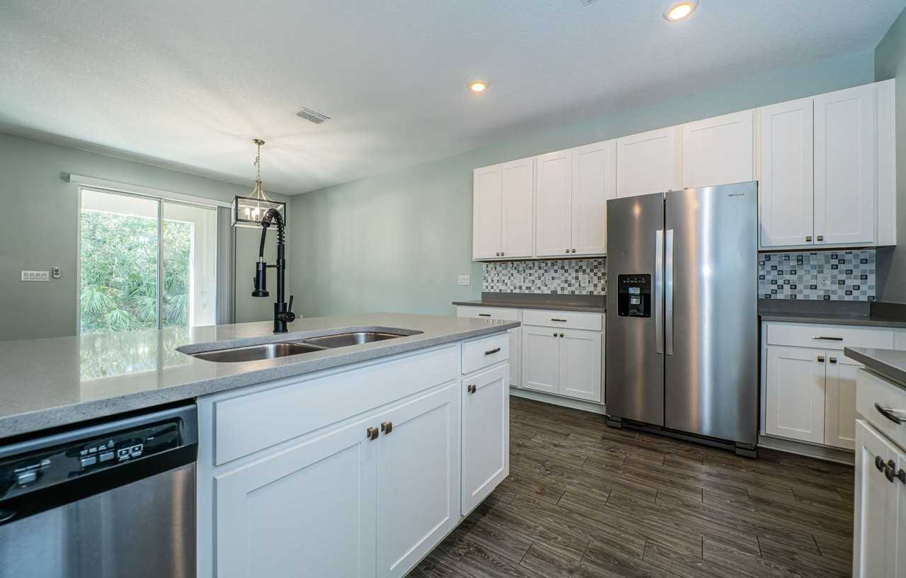 15008 Blue Quaker Pl - Photo 4 of 32