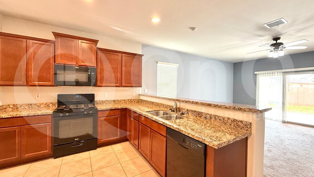 7036 S 77th Ln - Photo 6 of 26