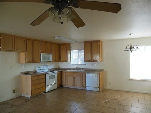 2430 E Whitmore Ave - Photo 2 of 3