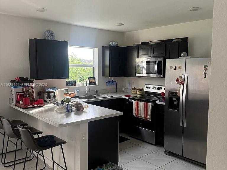 493 Ne 4th St - Photo 3 of 15