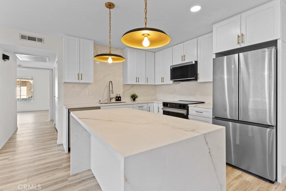 21921 Rimhurst Dr #21921128F - Photo 7 of 24