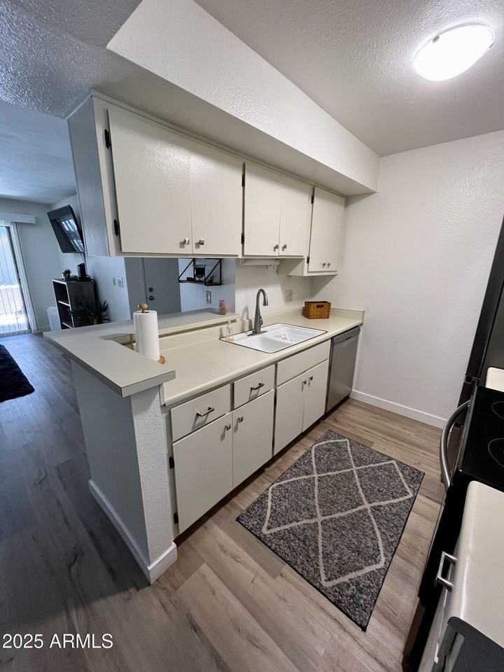 4554 Paradise Village Parkway North #102 - Photo 5 of 11