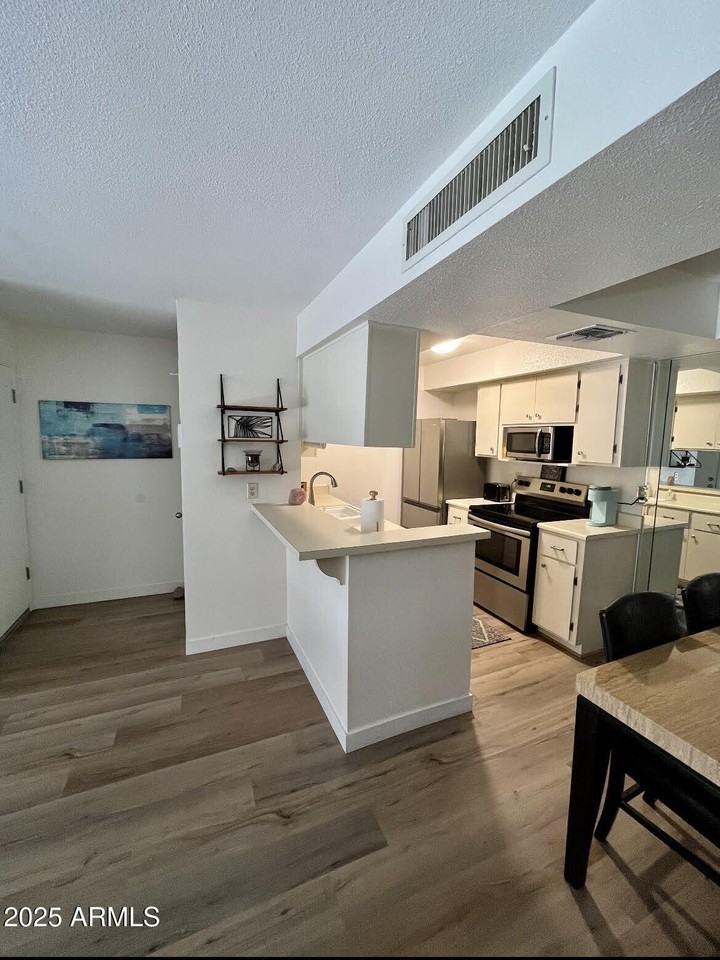 4554 Paradise Village Parkway North #102 - Photo 6 of 11