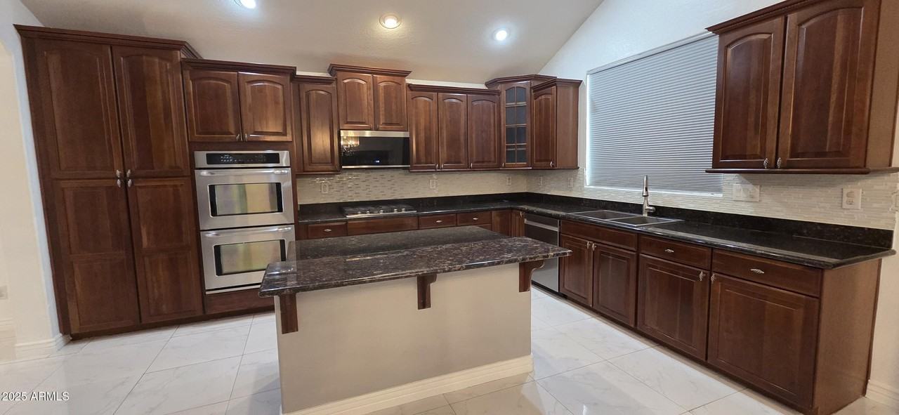 9418 South 46th Drive - Photo 5 of 32