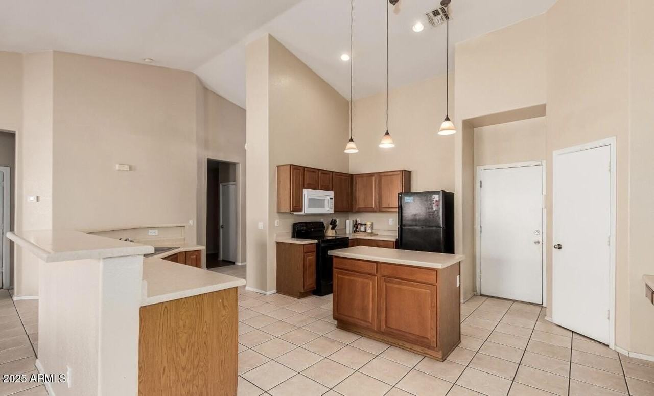 13014 West Surrey Avenue - Photo 3 of 33