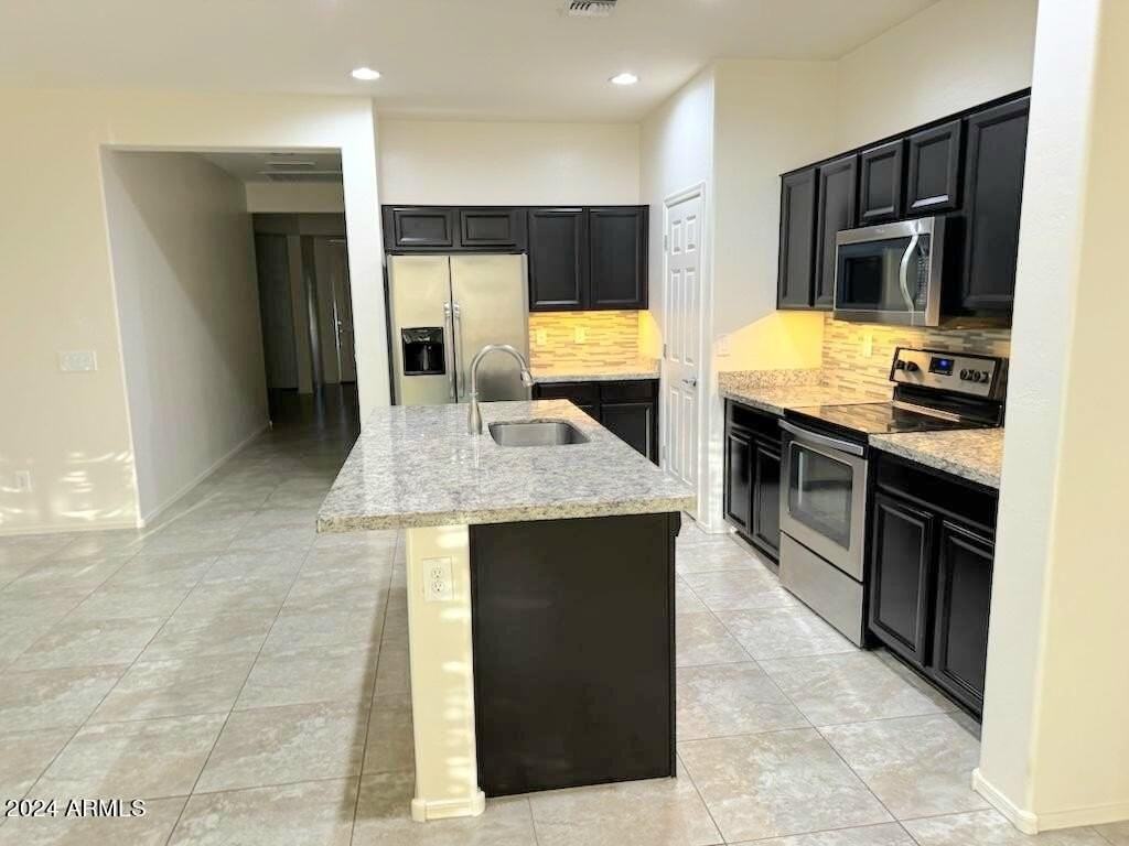 1026 N 169th Ave - Photo 4 of 24