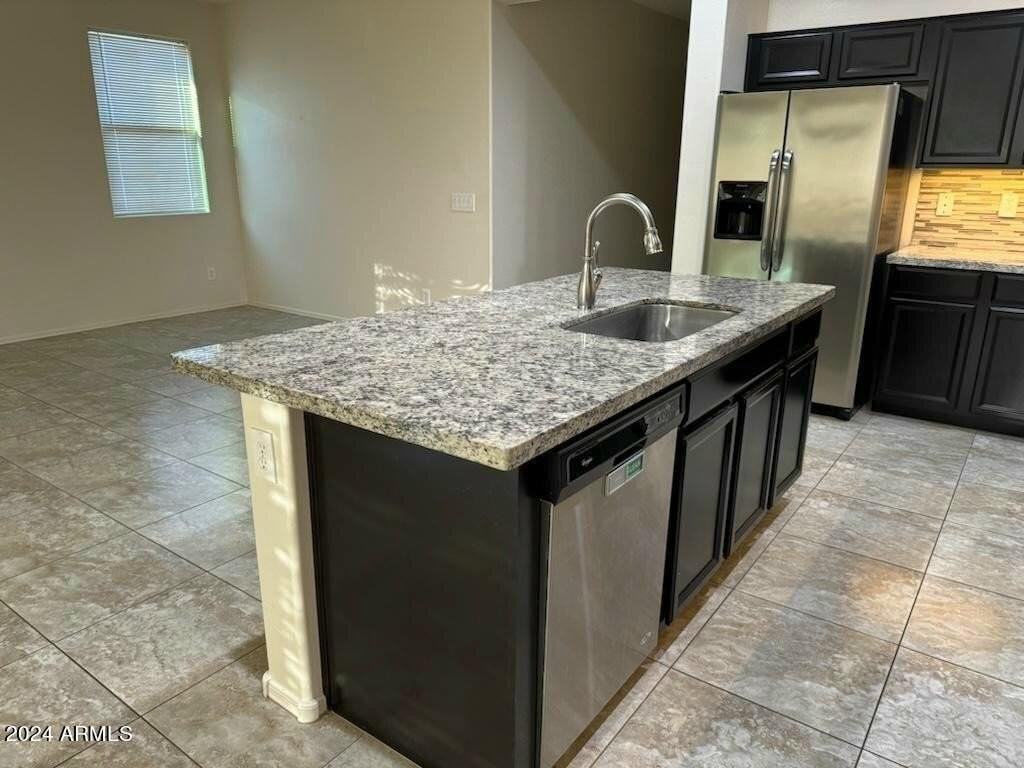 1026 N 169th Ave - Photo 5 of 24