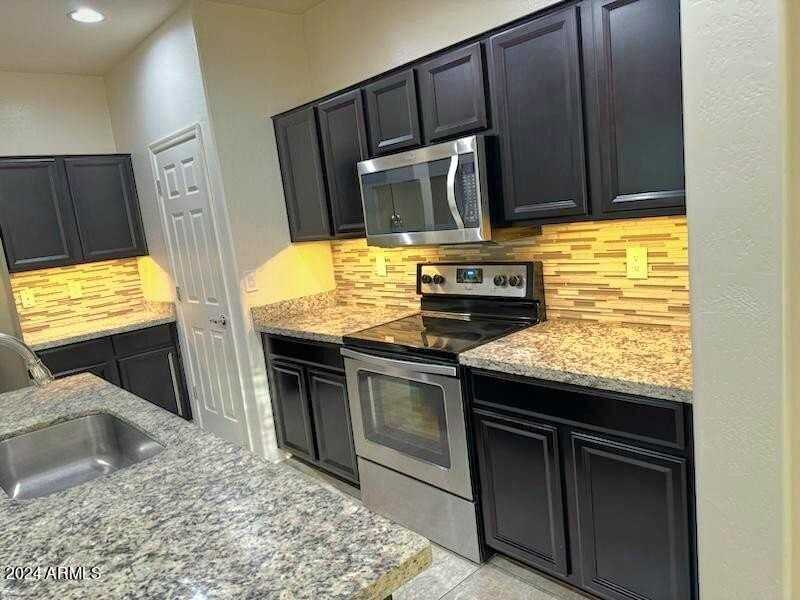 1026 N 169th Ave - Photo 6 of 24