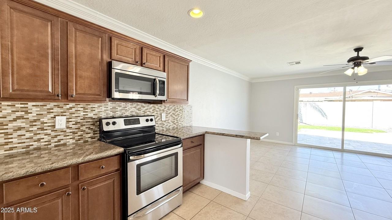 8608 E Vernon Ave - Photo 4 of 20