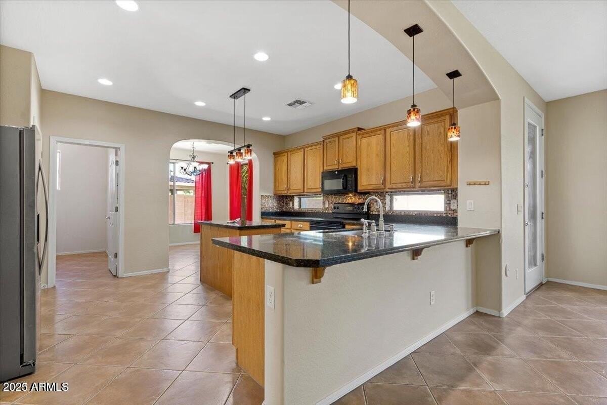 4173 S Wayne Pl - Photo 6 of 30