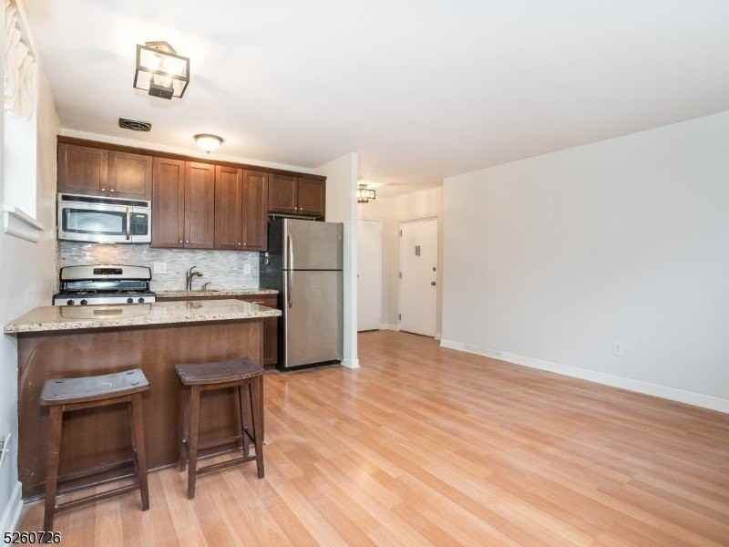 4850 Elm St #E - Photo 3 of 17