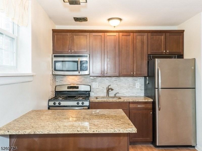 4850 Elm St #E - Photo 6 of 17