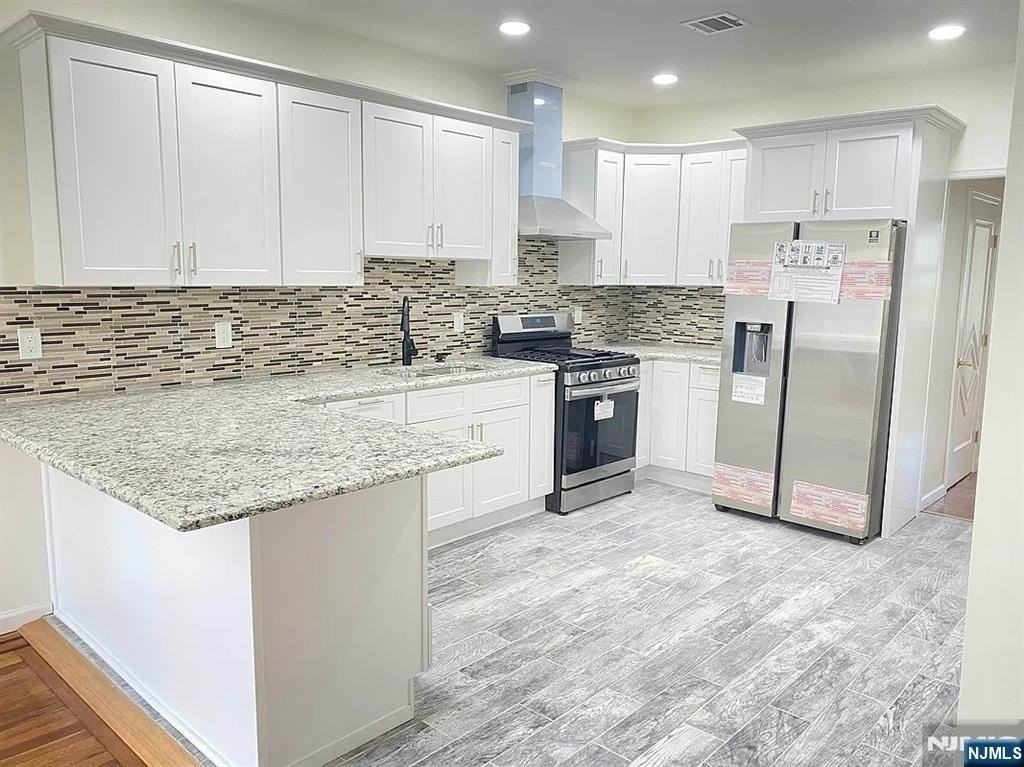 1008 74th St - Photo 2 of 4