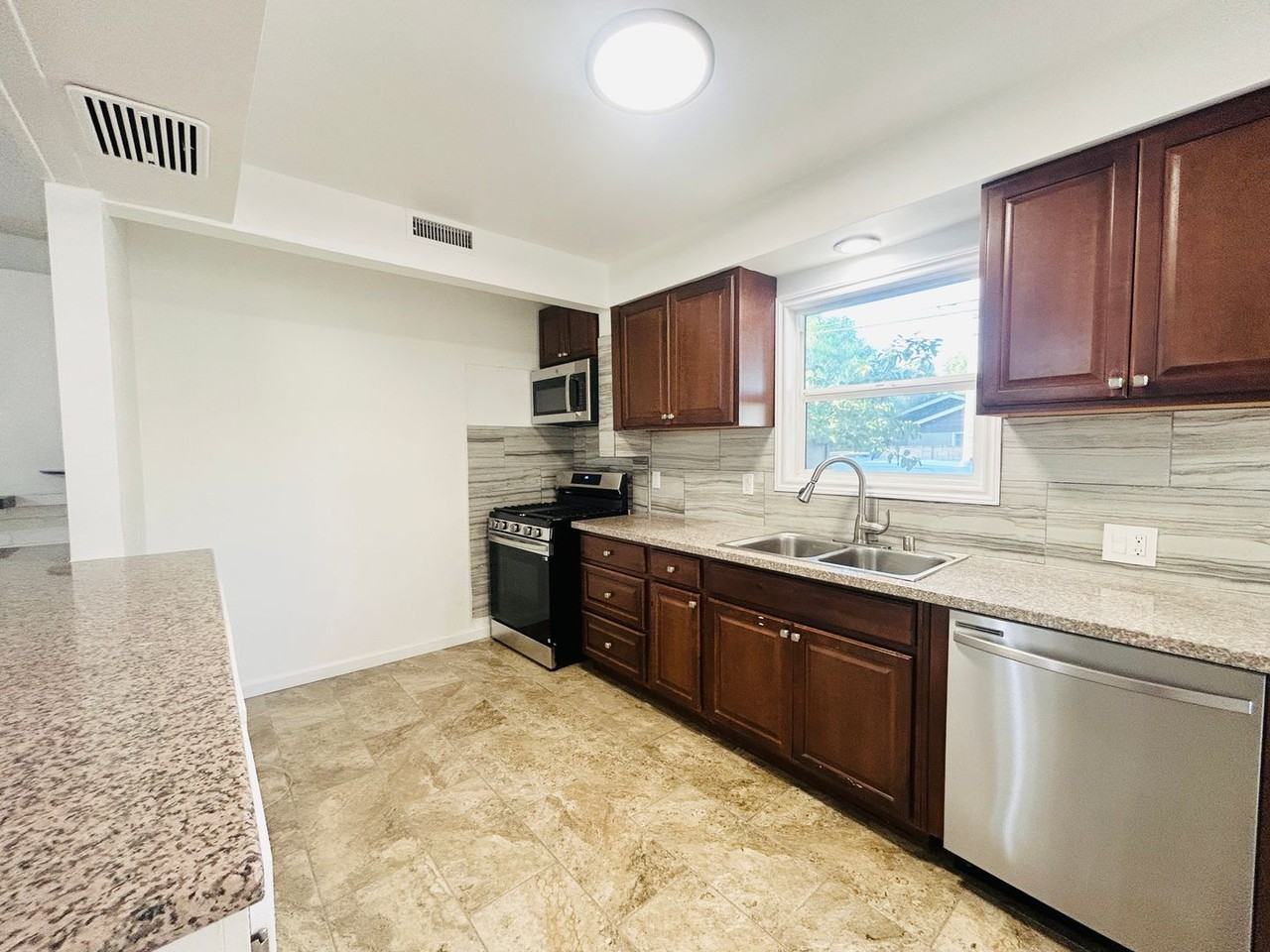 7358 Balcom Apartments - Photo 3 of 18