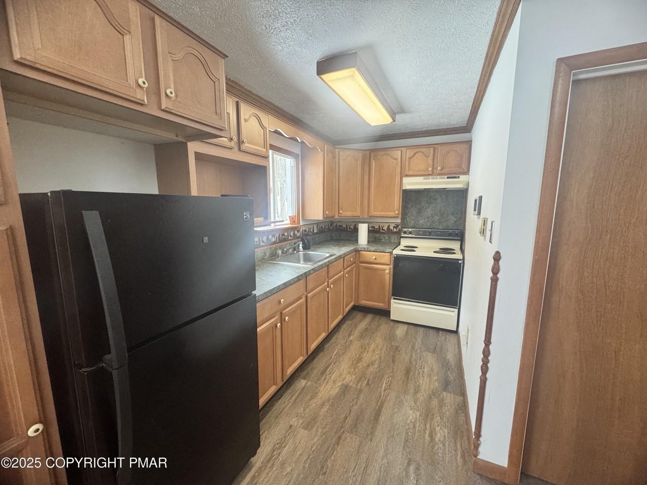 9870 Deerwood Dr - Photo 4 of 18