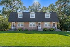 WHISPERING OAKS - Photo 1 of 1