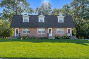 WHISPERING OAKS - Photo 1 of 1