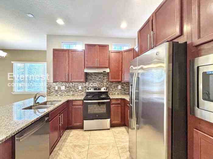 13873 Benavente Ave - Photo 3 of 28