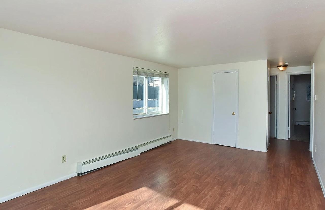10665 W 7th Ave – Spacious 2 & 3 Bedroom Apartments Near Oak Street Light Rail! - Photo 3 of 22