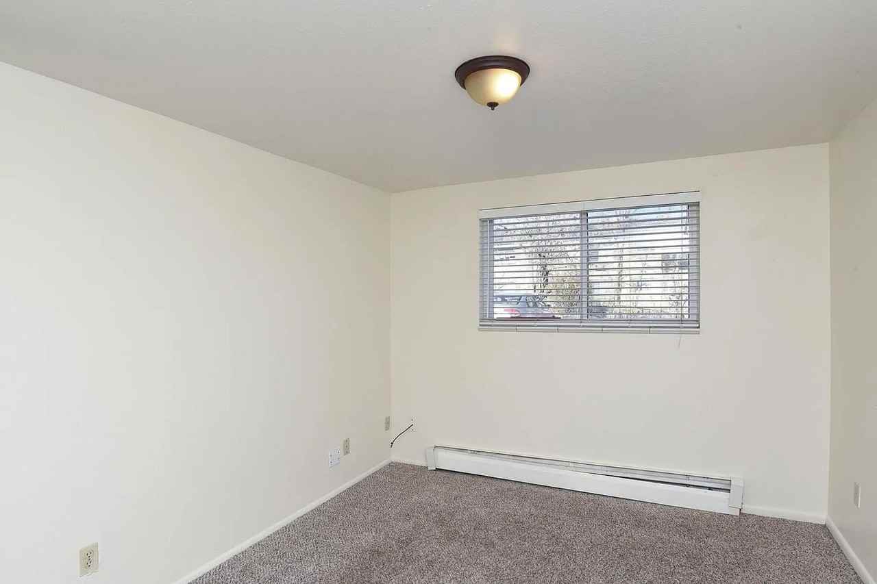10665 W 7th Ave – Spacious 2 & 3 Bedroom Apartments Near Oak Street Light Rail! - Photo 7 of 22