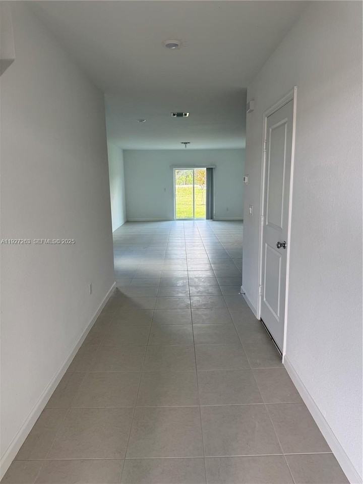 5837 Norwthwest Sweetwood Drive - Photo 3 of 23