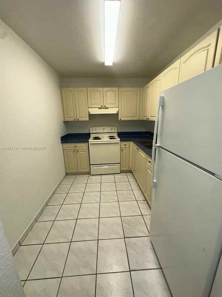 5665 W 20th Ave #308 - Photo 3 of 17