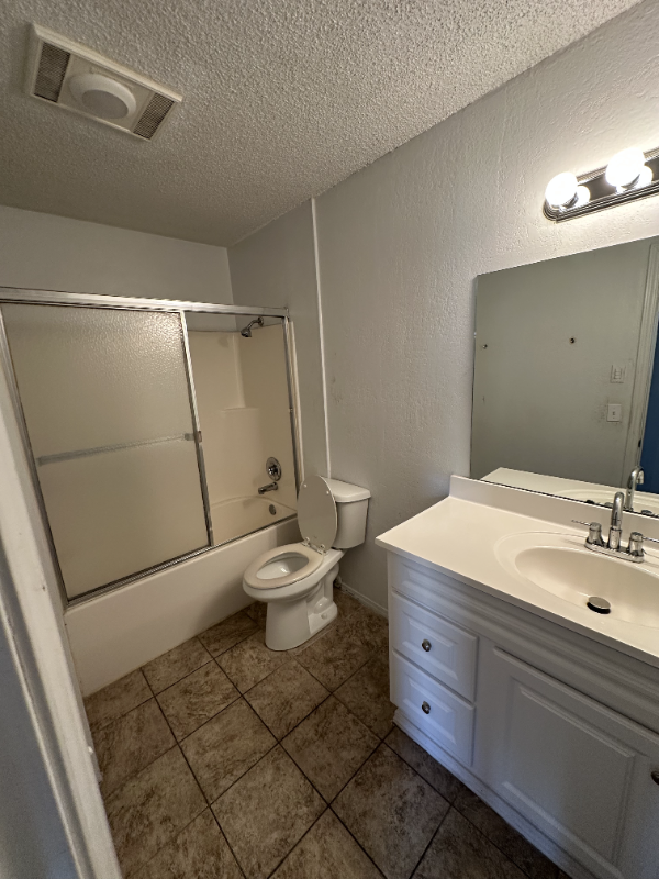 12919 East 31st Street South - Photo 3 of 9