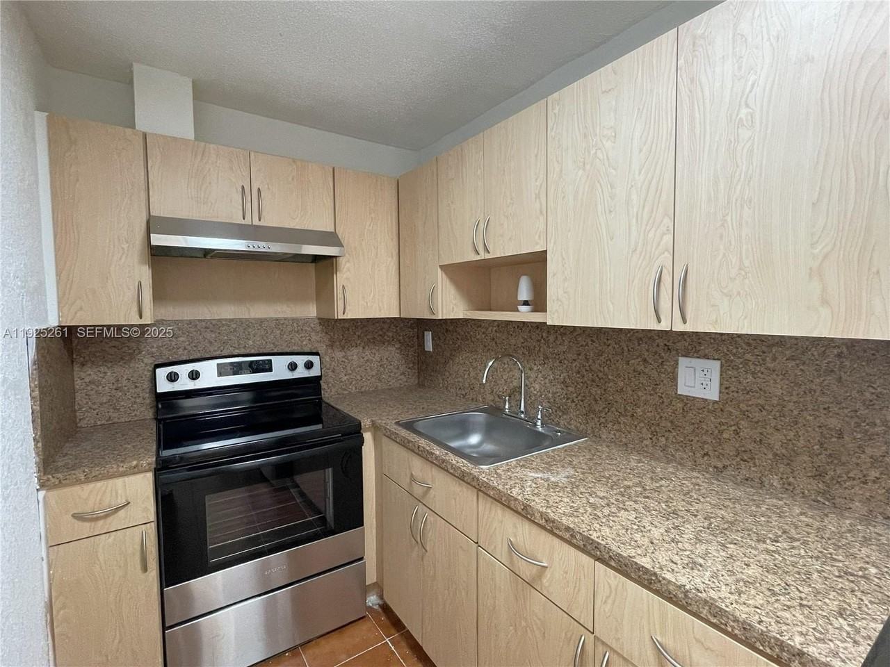 4721 Nw 7th St #104-12 - Photo 4 of 16