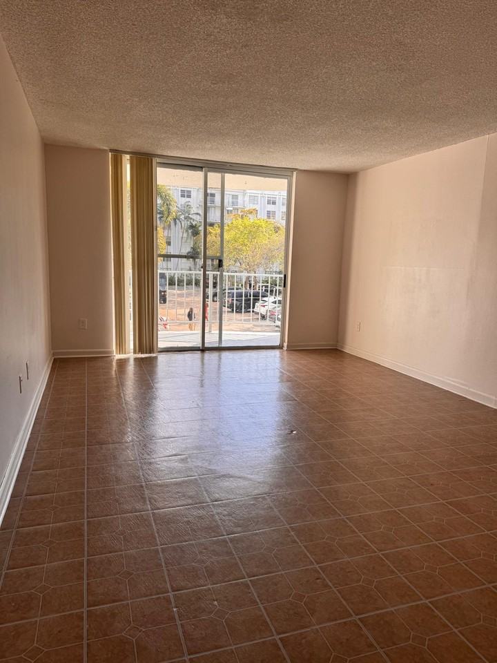 484 Northwest 165th Street #1 - Photo 3 of 10