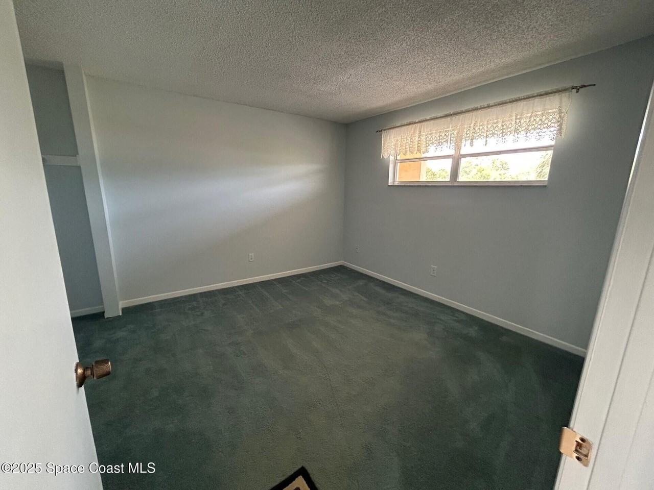 2135 North Courtenay Parkway #F244 - Photo 3 of 10