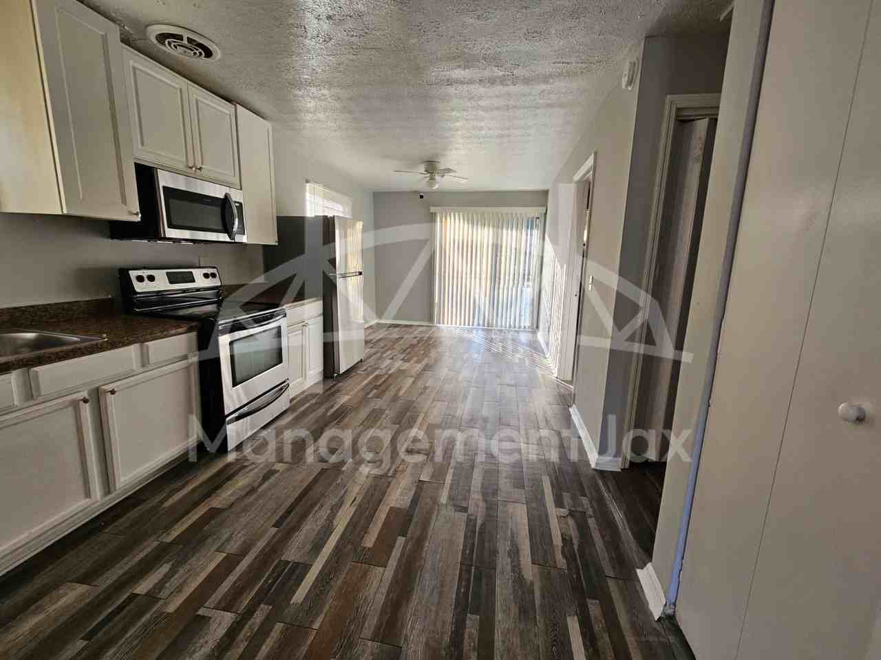 7216 Ken Knight Dr W #1 - Photo 4 of 15