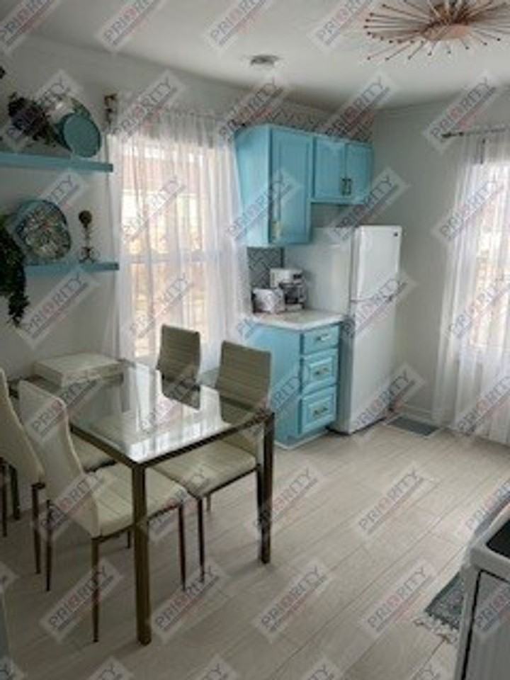 307 W 3rd St - Photo 3 of 16