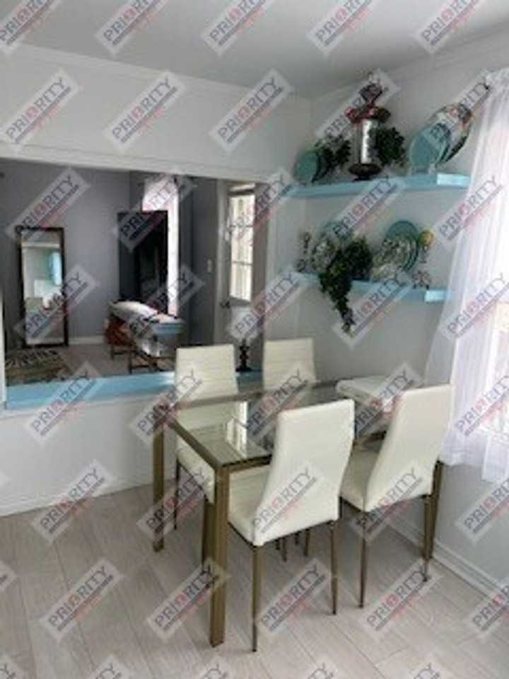 307 W 3rd St - Photo 4 of 16