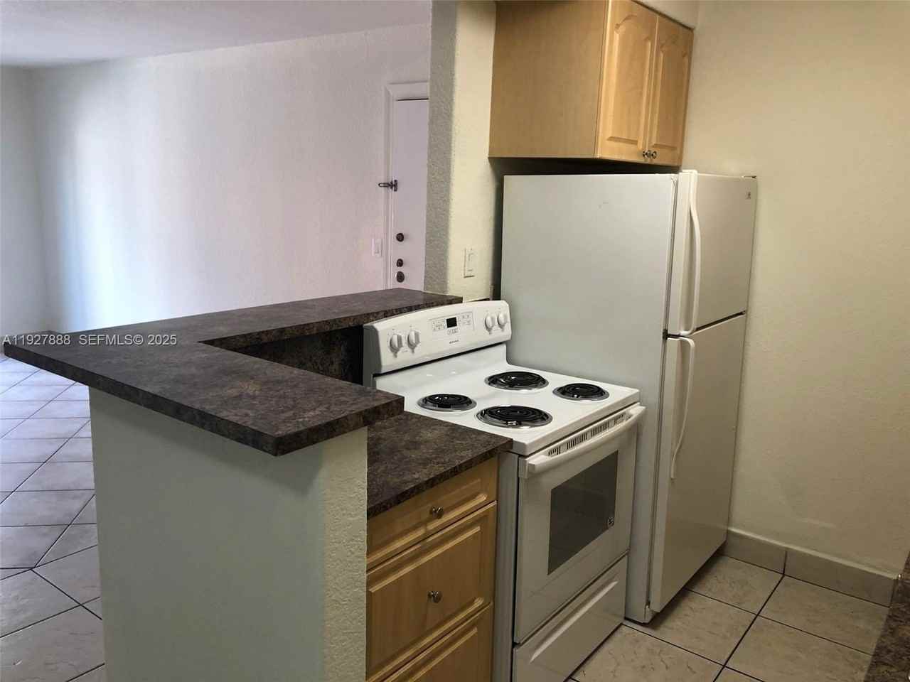 10744 N Kendall Dr #M16 - Photo 2 of 21