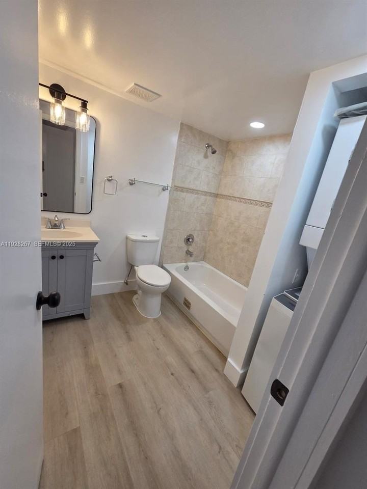 10023 Winding Lake Rd #104 - Photo 2 of 20