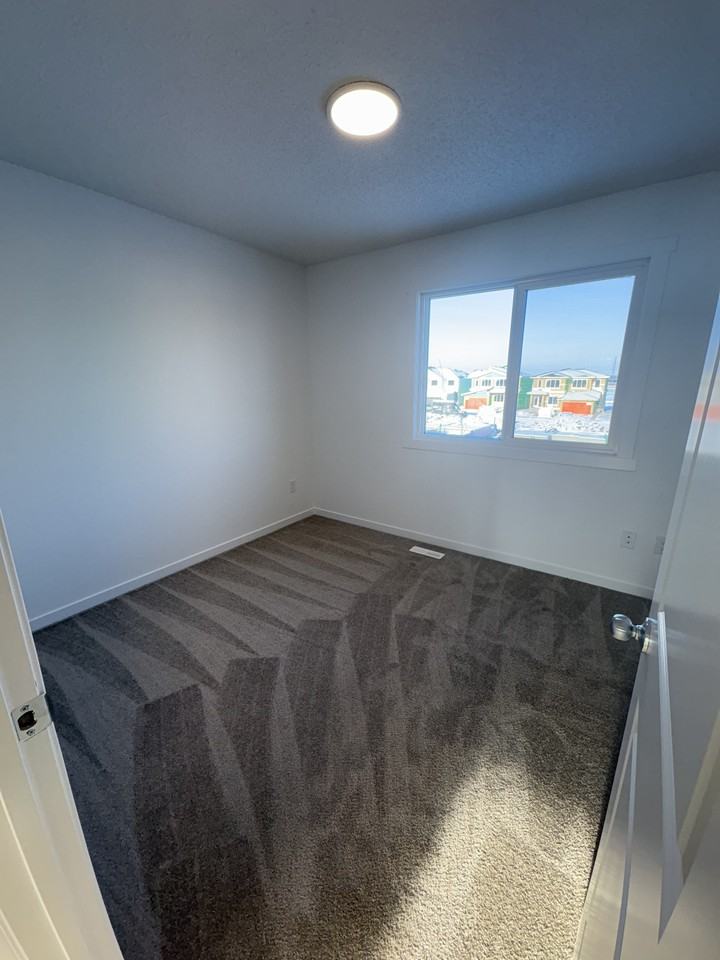 244 Marquis Boulevard Northeast - Upper - Photo 3 of 32