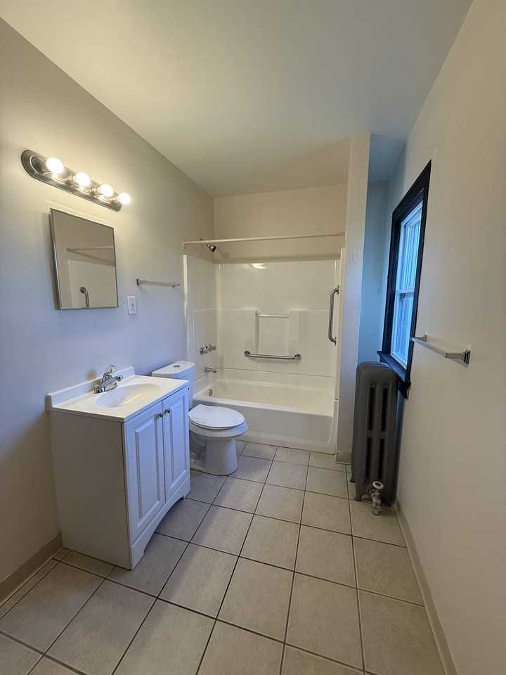 719 E 157th St #UP - Photo 7 of 9