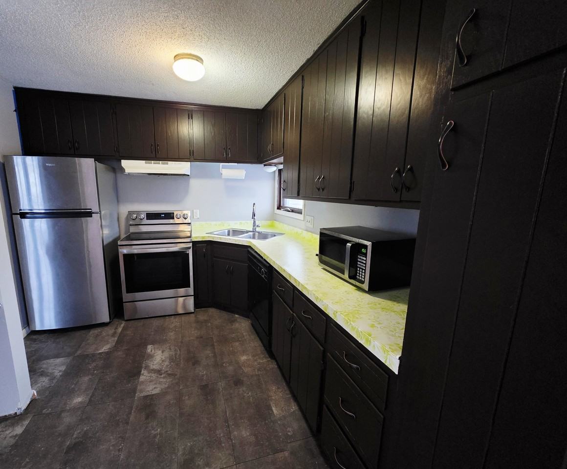 8425 Brunswick Ave N #1 - Photo 6 of 18